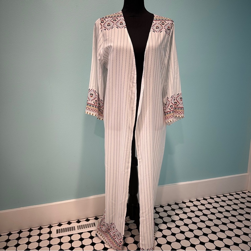 Jen & Co. duster or swim cover.